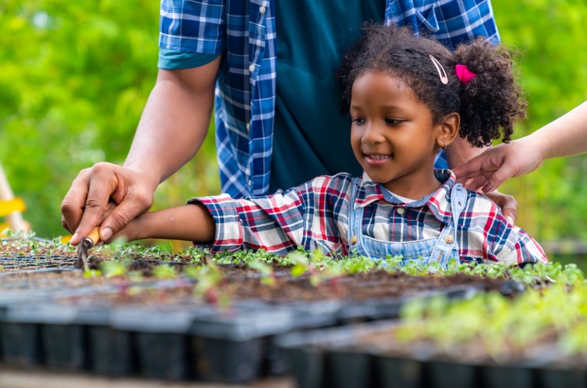 A family gardening together for wellness